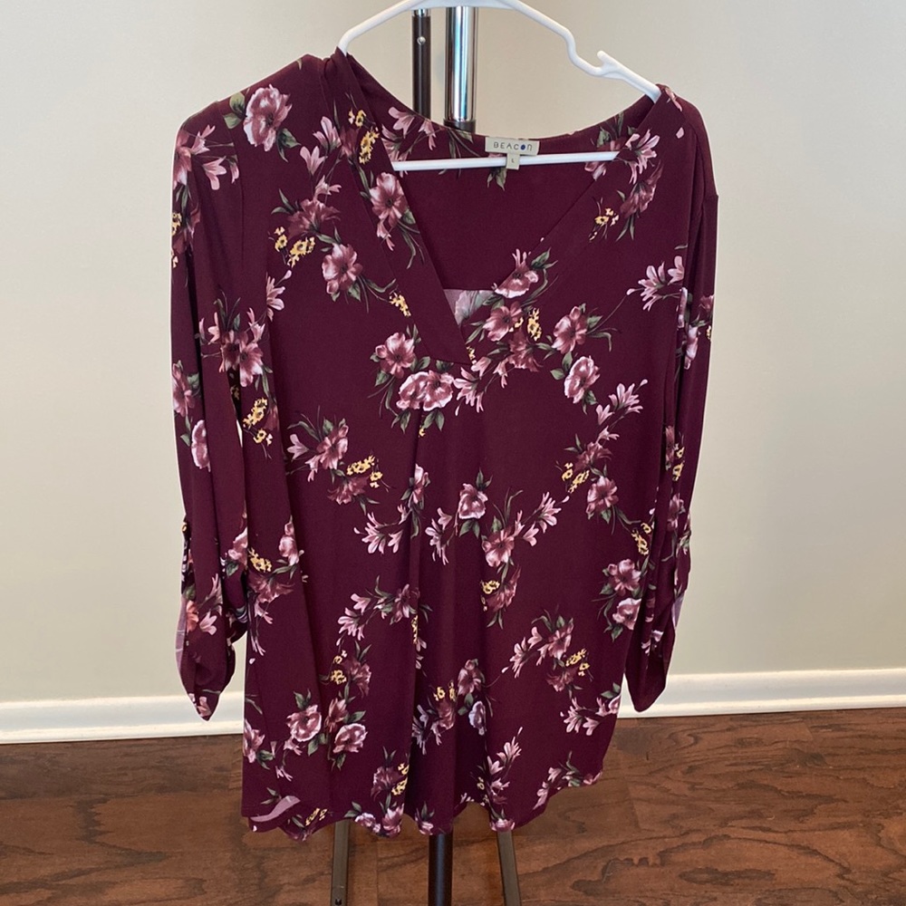 Beacon size large top. Burgundy floral pattern.